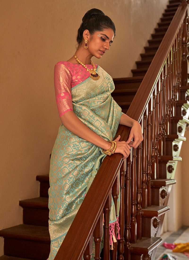 Teal And Peach Weaved Crape Silk Saree