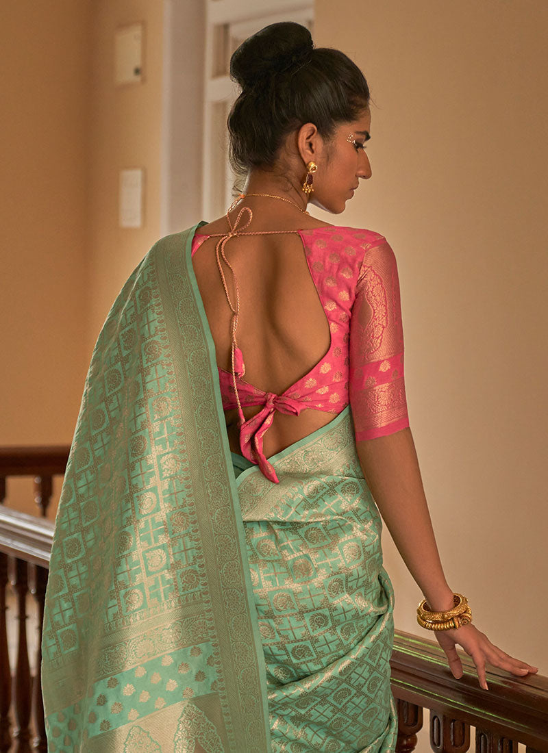 Teal And Peach Weaved Crape Silk Saree