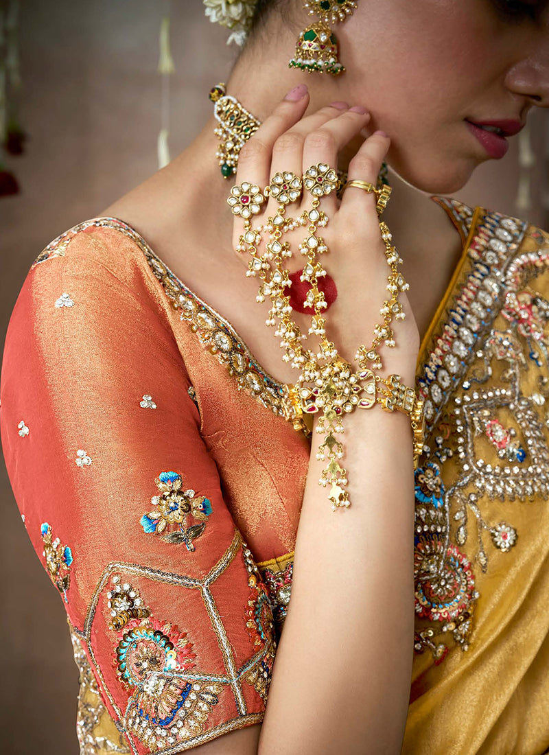 Yellow And Orange Multi Embroidery Tissue Silk Saree