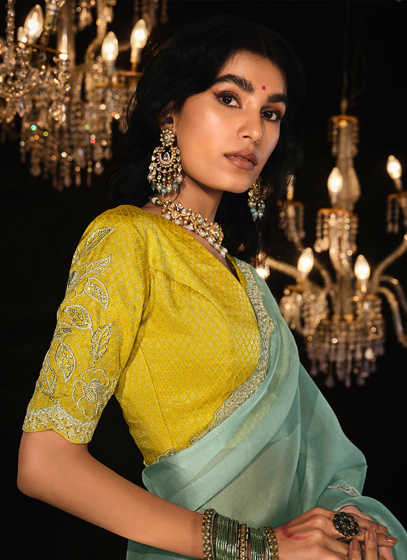 Teal And Yellow Reshamkari Embroidery Fancy Silk Saree