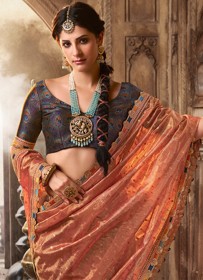 Peach And Blue Multi-Embroidery Tissue Silk Saree