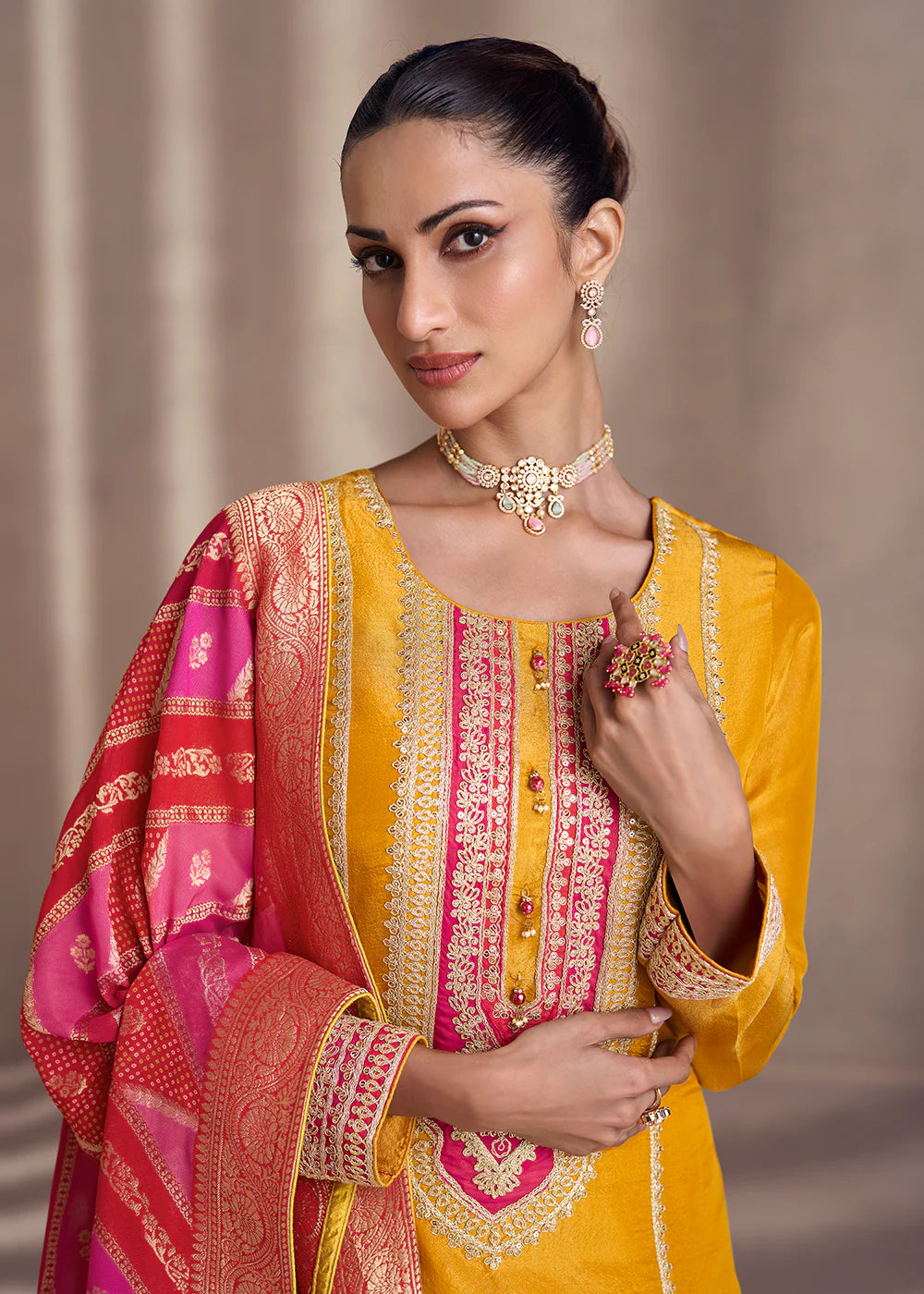 Yellow and pink embroidered silk salwar suit