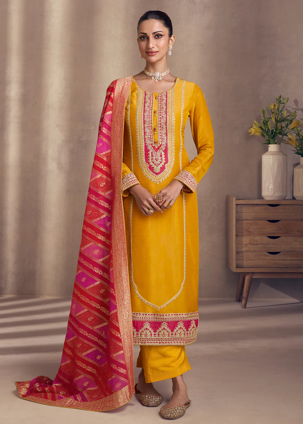 Yellow and pink embroidered silk salwar suit