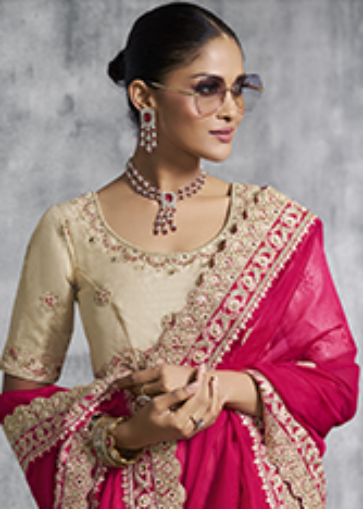 Amaranth Tissue Zari Embroidered Saree.