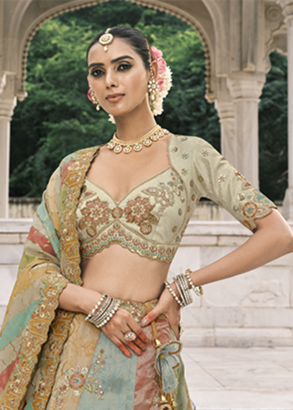 Cream-Olive Embroidered Silk Bridal Lehenga.