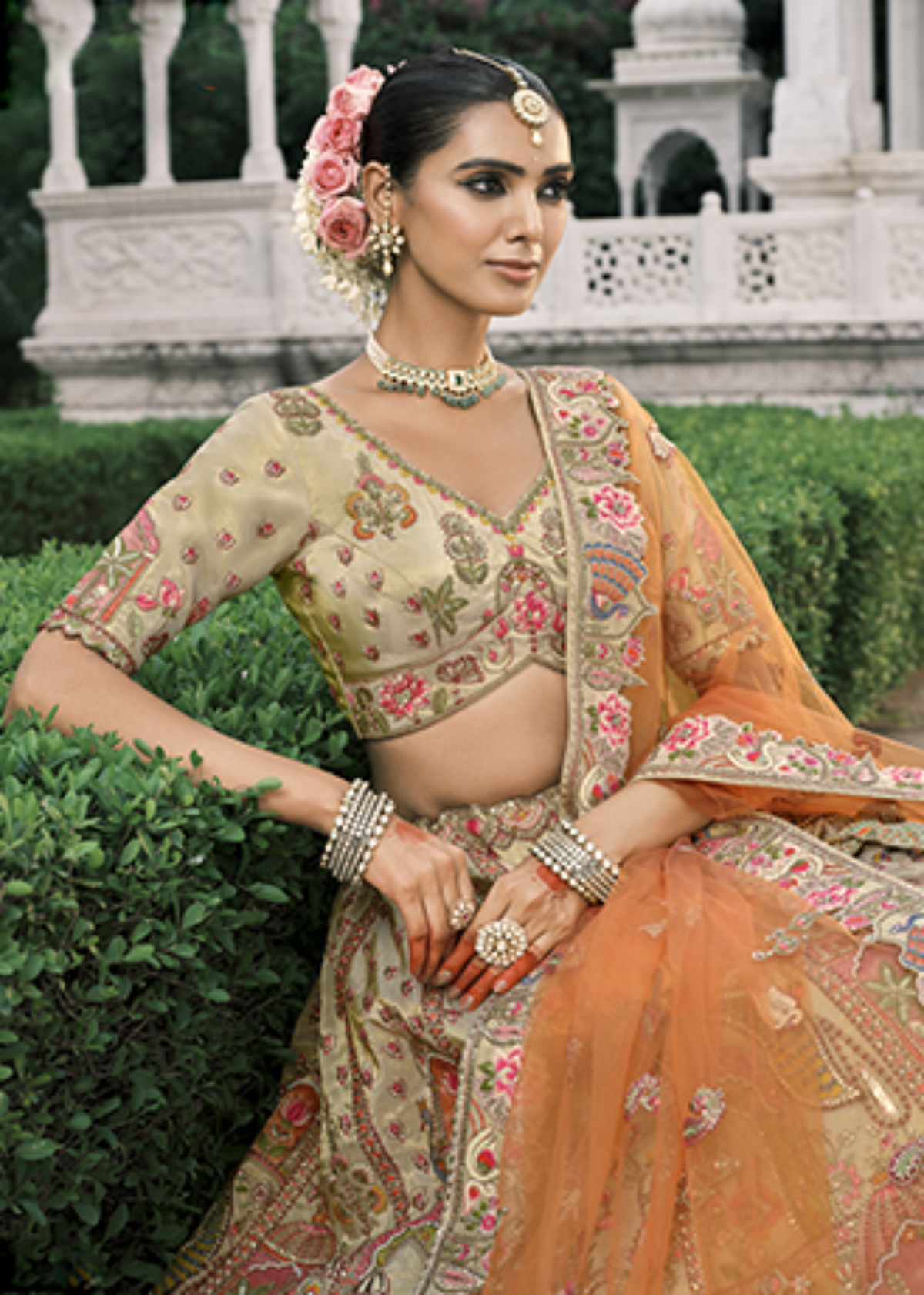 Cream-Orange Embroidered Silk Bridal Lehenga.