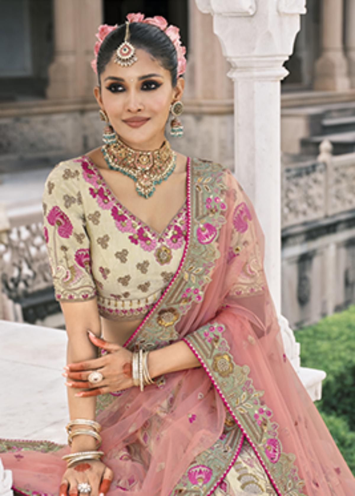 Cream Embroidered Silk Bridal Lehenga.