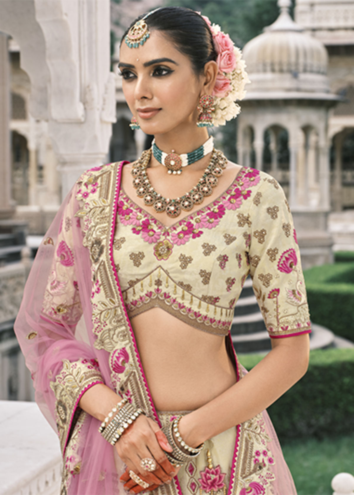 Cream Embroidered Silk Bridal Lehengaa.
