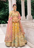 Cream–Teal Yellow Embroidered Silk Bridal Lehenga
