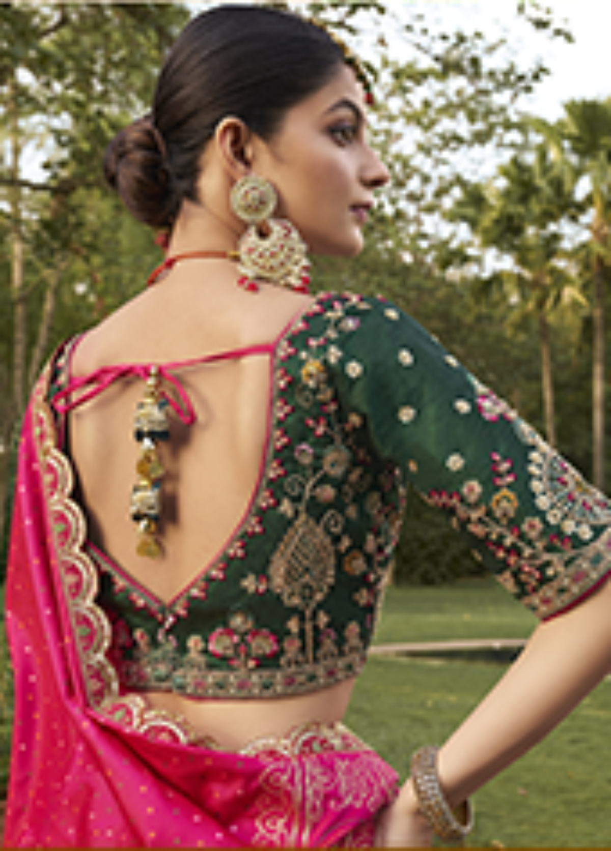 Green–Pink Royal Zarkan Banarasi Silk Lehenga.