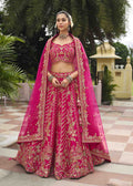 Magenta Majestic Embroidered Bridal Silk Lehenga.
