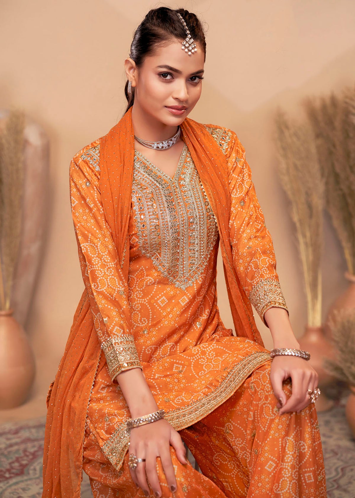 Buy Orange Bandhani Printed Sharara Suit