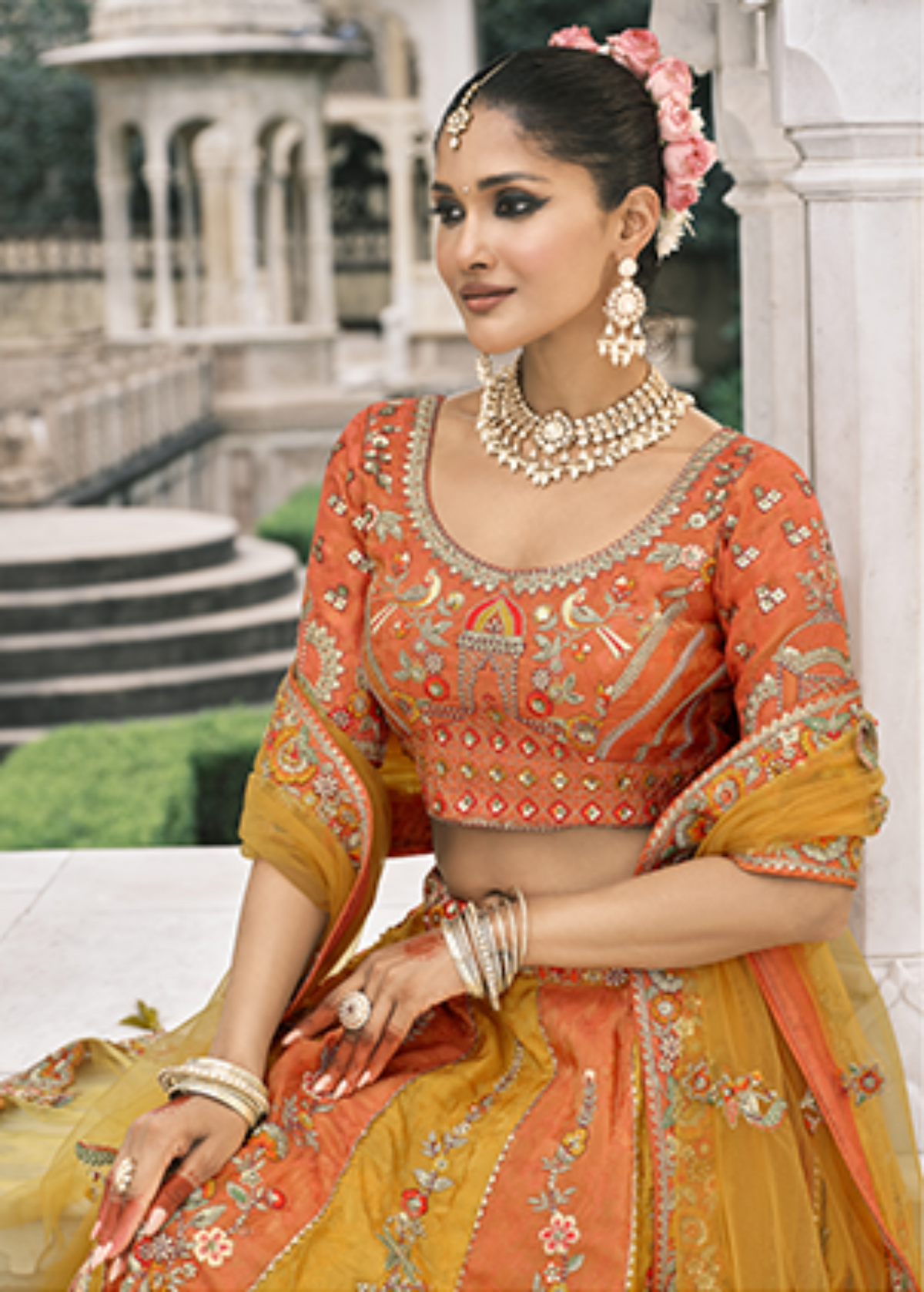 Orange Embroidered Silk Bridal Lehenga.