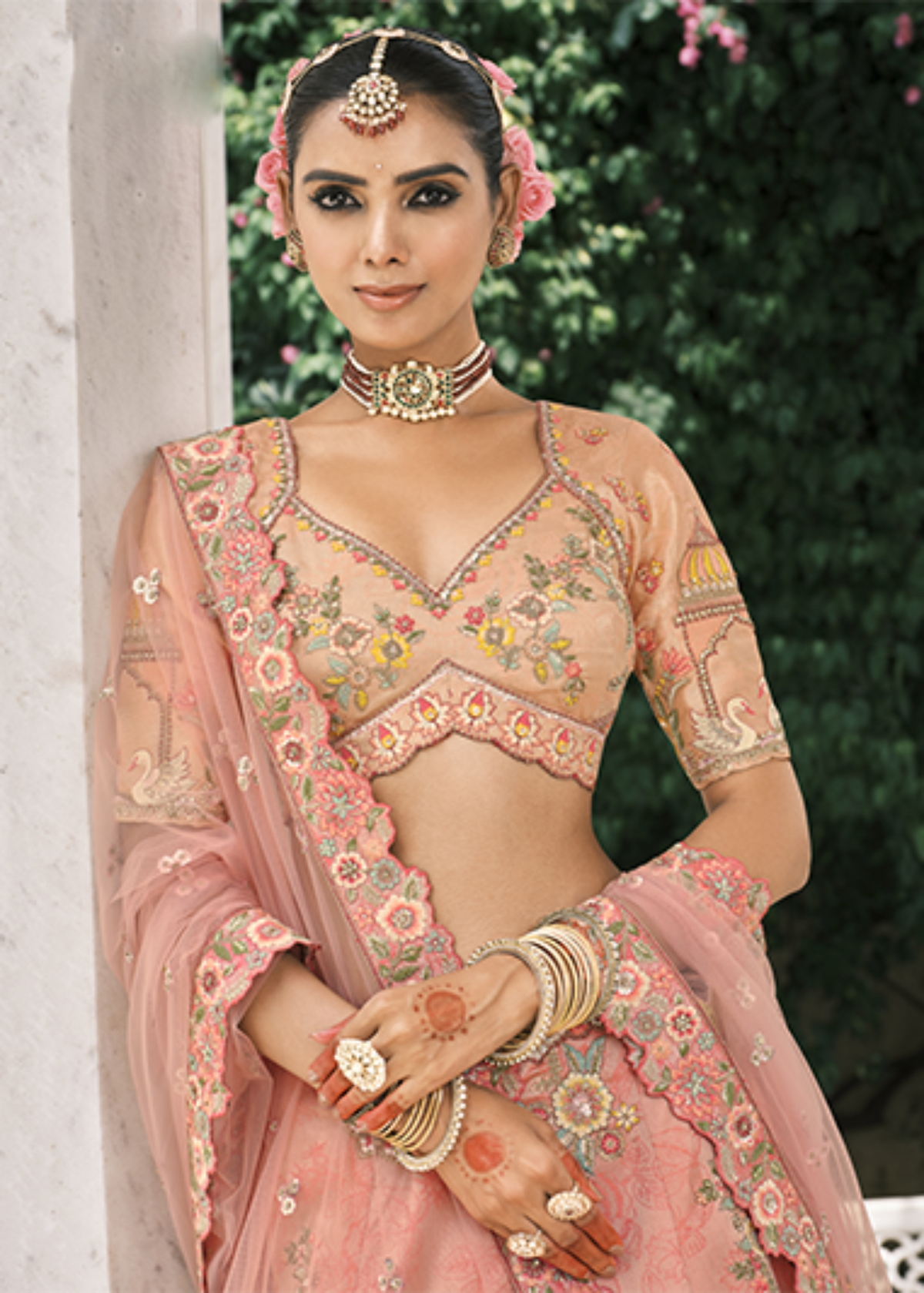 Peach Embroidered Silk Bridal Lehenga.