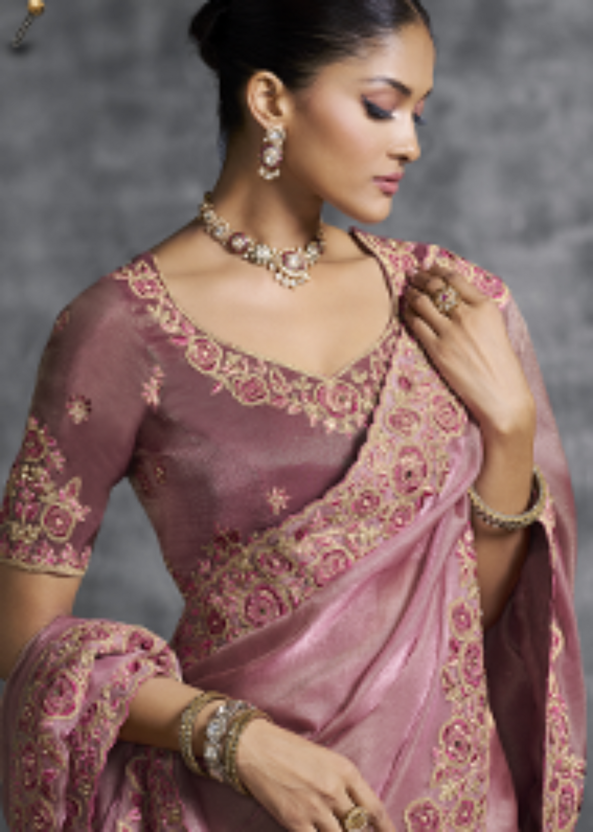 Pink Tissue Zari Embroidered Saree.