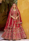 Red Magnificent Embroidered Traditional Bridal Lehenga.