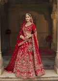 Red Opulent Embroidered Bridal Silk Lehenga.