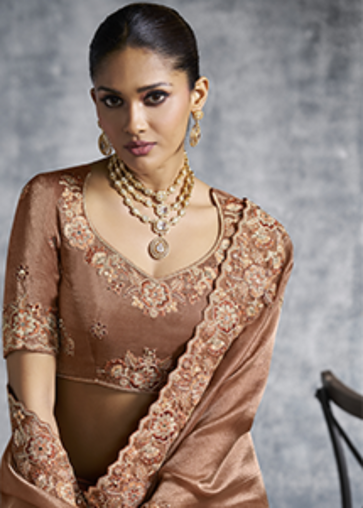 Rich Copper Tissue Zari Embroidered Saree.