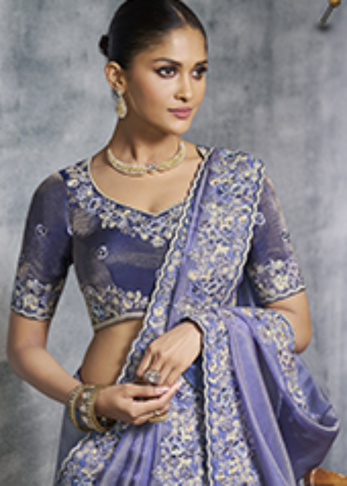 Royal Lavender Tissue Zari Embroidered Saree.