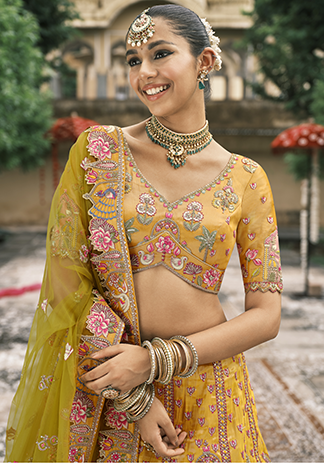 Rust Orange Embroidered Silk Bridal Lehenga.