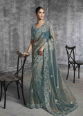 Teal Green Tissue Zari Embroidered Saree.