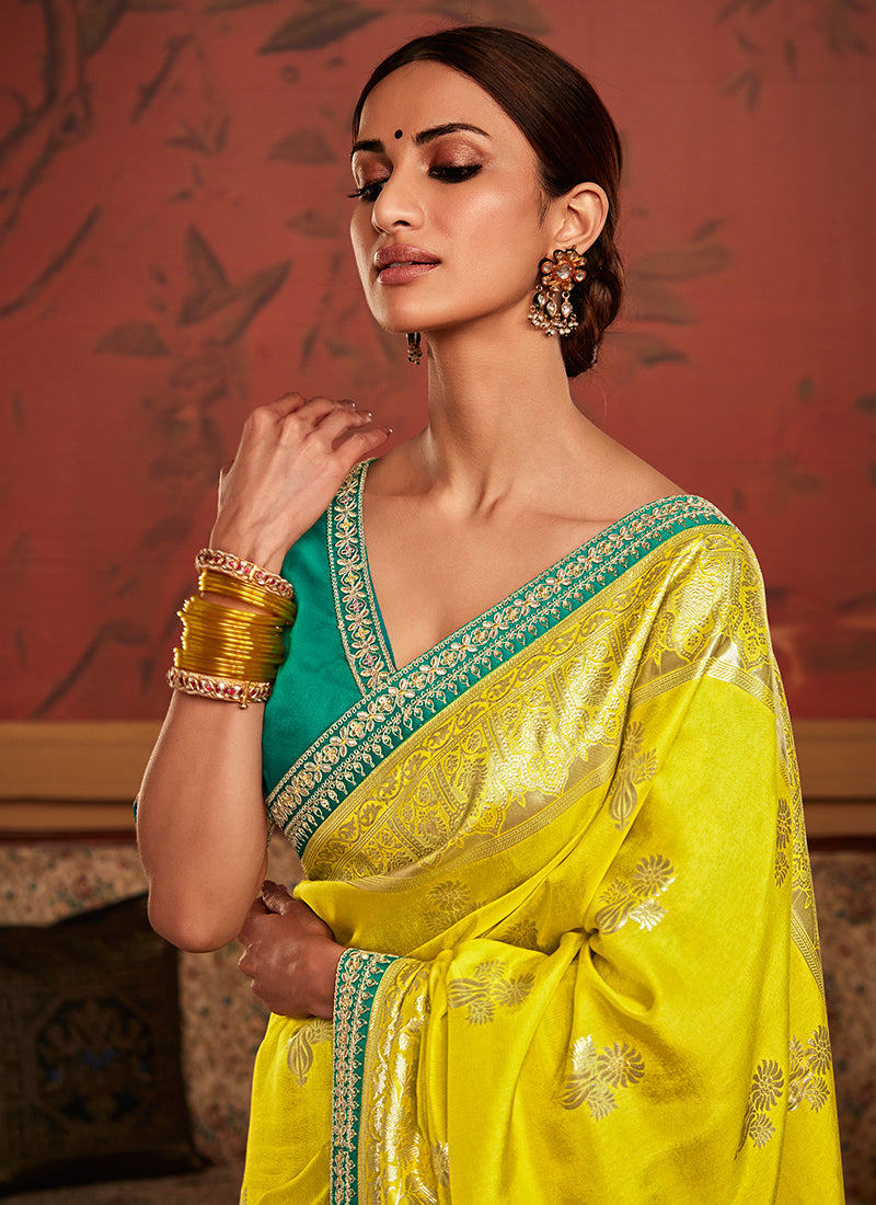 Yellow And Teal Weaved Pure Dola Silk Saree