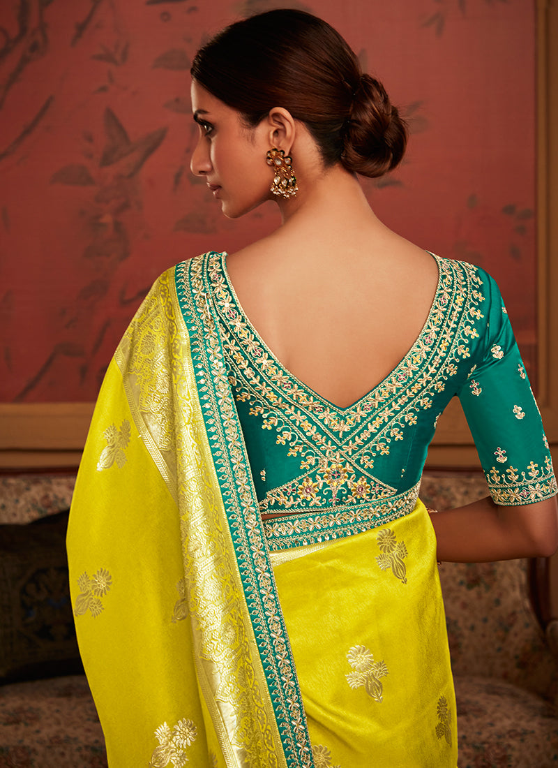 Yellow And Teal Weaved Pure Dola Silk Saree