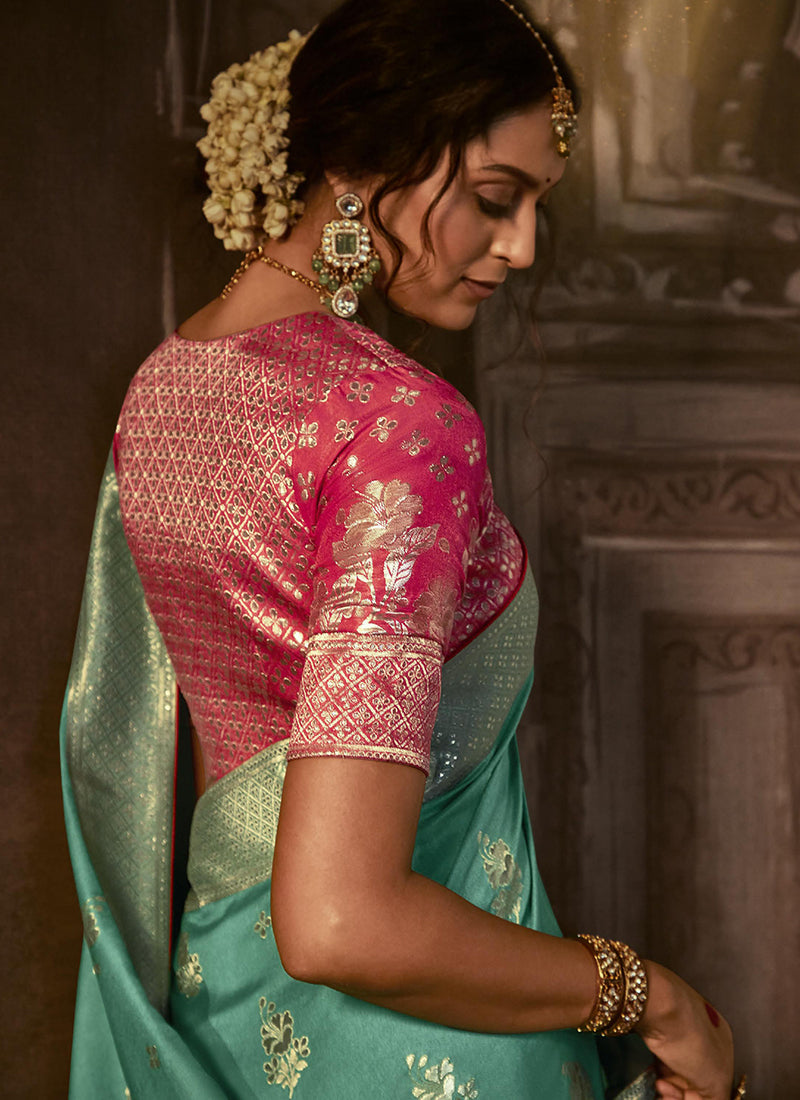 Teal And Pink Weaved Pure Dola Silk Saree