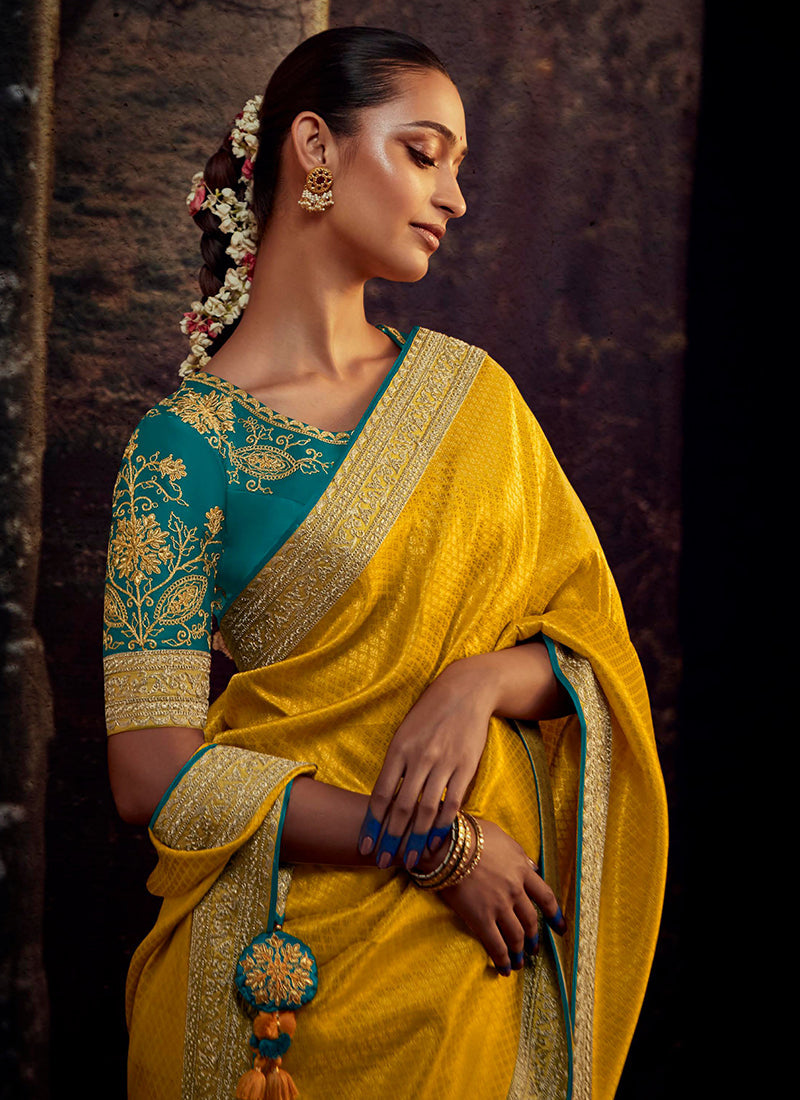 Yellow And Turquoise Embroidered Organza Silk Saree